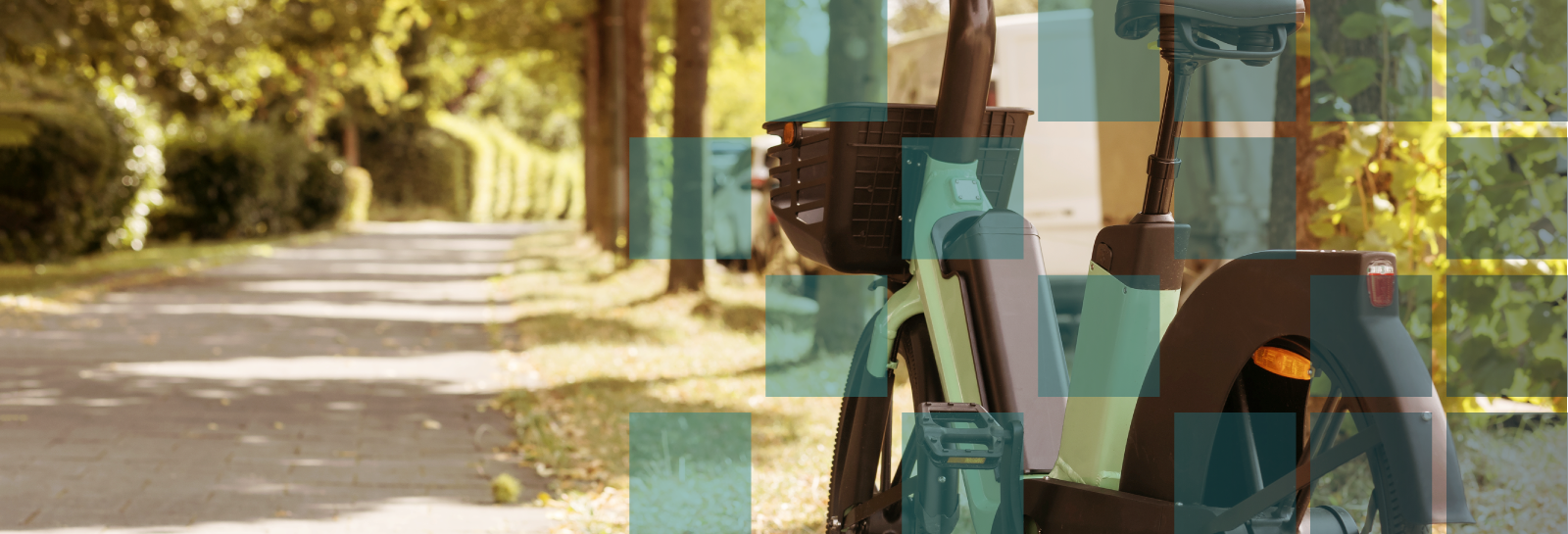 Electric bike stands on a path on a sunny day banner image